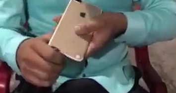 Thanh niên chơi lớn khui bia bằng Iphone 7