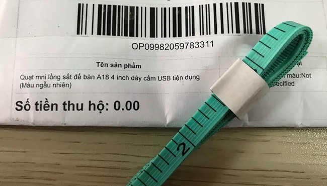 Mua quạt mini lồng sắt trên Lazada, khách nhận về...thước dây đo vải