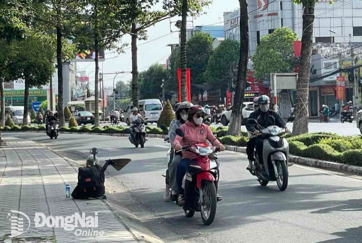 Dong Nai: Tinh trang an xin xuat hien tai cac dia diem du lich mung 1 Tet