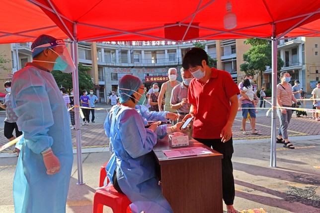 Trung Quoc hon 1 ty nguoi da tiem chung tai sao dich COVID-19 van chua het?-Hinh-6