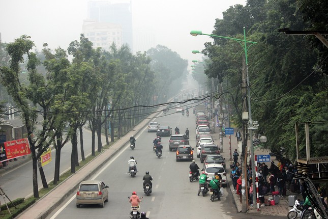 Anh: Ha Noi “bien” thanh SaPa, suong mu che kin nha cao tang